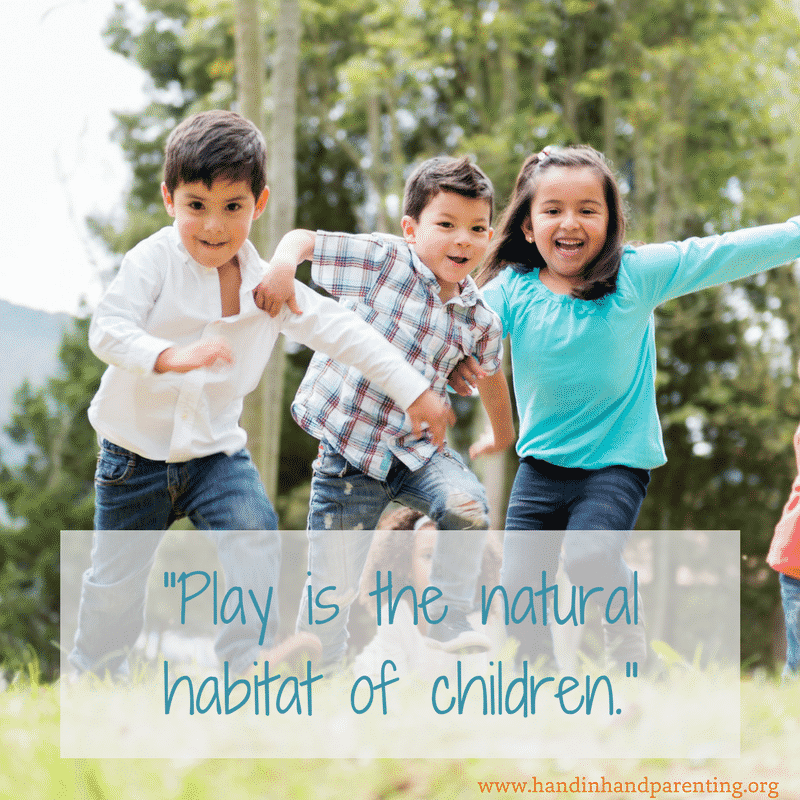 three children hard at play outside in the woods in summer