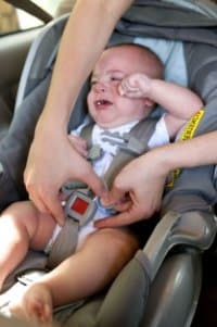 child crying car seat safety travel