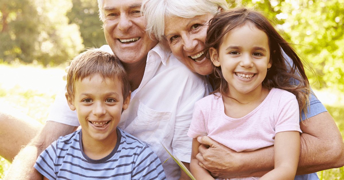 grandparents hugging grandchildren