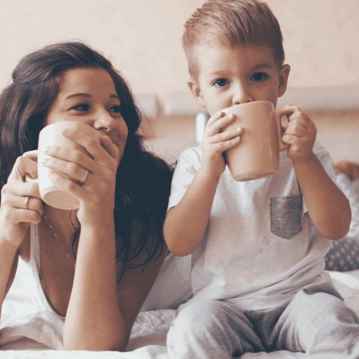 boy relaxing with son