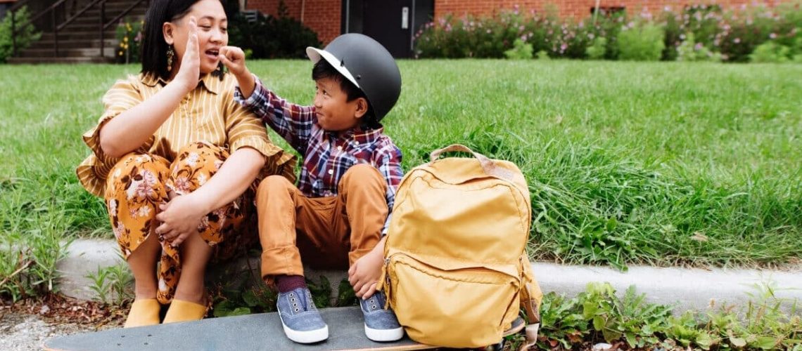 Mom helping boy with school issues