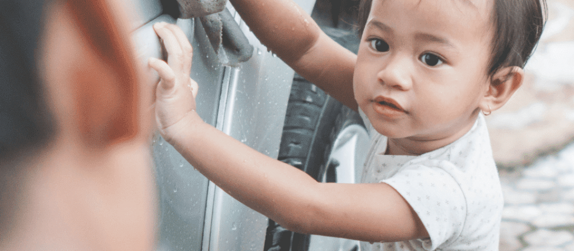girl cleaning dads car (1)